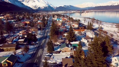 4K-Drone-Video-of-Homes-in-Seward,-Alaska-on-a-Snowy-Winter-day