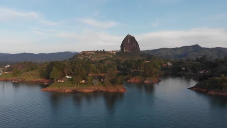 Aerial-drone-shot-of-Guatape-lake-in-the-mountains-of-Colombia-during-the-day