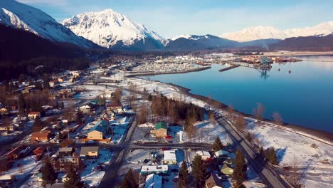 4K-Drone-Video-of-Homes-in-Seward,-Alaska-on-a-Snowy-Winter-day