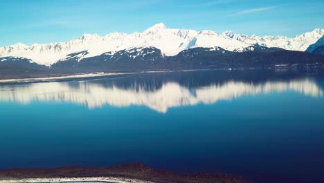4K-Drone-Video-of-Snow-Covered-Mountains-Surrounding-Seward,-Alaska-During-Winter