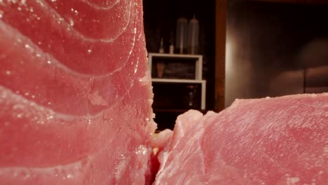 Fresh-raw-tuna-on-kitchen-table