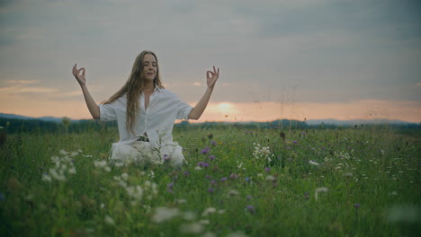 Woman-Meditation-On-A-Meadow