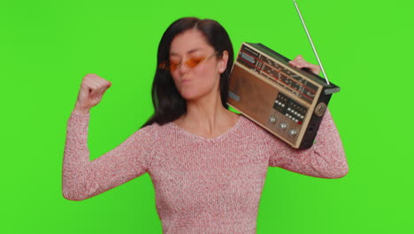 Woman-using-retro-tape-record-player-to-listen-music,-disco-dancing-of-favorite-track,-having-fun