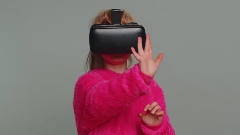 Preteen-child-girl-kid-using-headset-app-to-play-simulation-game-watching-virtual-reality-3D-video