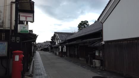 Town-of-Sasayama-in-Tamba-Historical-City-of-Japan-Old-Houses-and-Red-Mailbox-Establishing-Shot-Picturesque-Landscape
