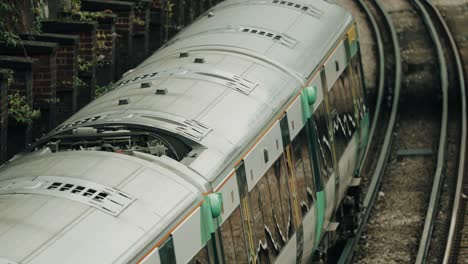A-train-departing-cinematic-closeup-shot-from-above