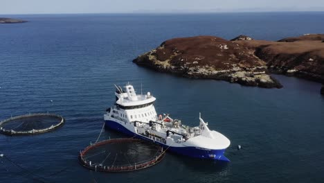 Drone-shot-of-a-fish-farming-well-boat-near-the-Outer-Hebrides