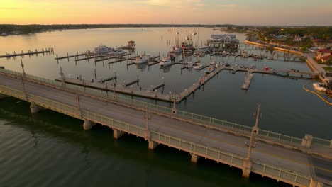 Aerial-video-on-a-golden-sunrise-in-Saint-Augustine,-FL-over-the-Matanzas-River