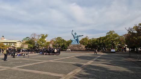 View-of-the-atomic-peace-memorial-in-Nagasaki-with-the-blue-statue-and-visitors