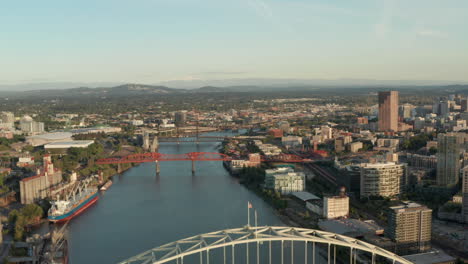 Dolly-back-aerial-shot-revealing-Fremont-bridge-and-Portland-Oregon