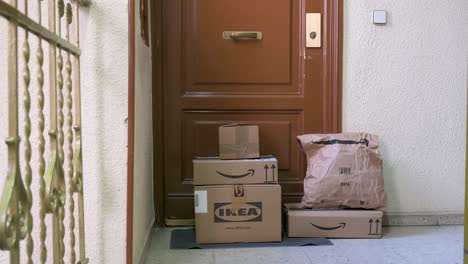 Amazon-and-Ikea-delivery-packages-are-placed-in-front-of-a-buyer's-door