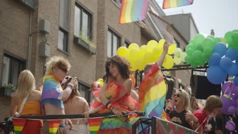 People-dancing-on-a-truck-during-the-Antwerp-Pride-Parade-2023-in-Belgium