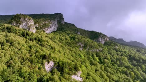Aerial-tilt-up-Grandfather-Mountain-from-Linville-NC