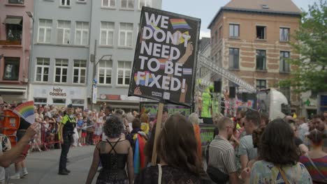 People-holding-signs-during-the-Antwerp-Pride-Parade-2023-in-Belgium