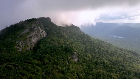 Clouds-hover-over-Grandfather-Mountain-aerial-from-Linville-NC,-North-Carolina