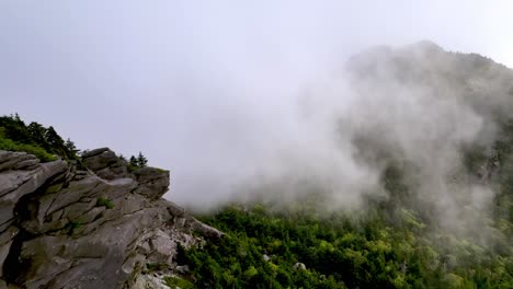 Clouds-move-in-aerial-atop-Grandfather-Mountain-from-Linville-NC,-North-Carolina