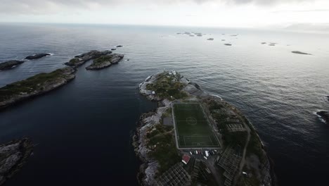 Cinematic-FPV-drone-shot-stabilized-from-lofoten-flying-over-Henningsvaer-stadium