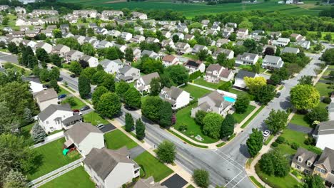 Wide-shot-of-large-American-neighborhood-full-of-family-houses-and-homes