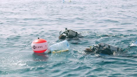 Ocean-Conservancy-Volunteer-Organization-Protecting-Environment-With-Scuba-Divers-In-The-Indian-Ocean,-Kenya