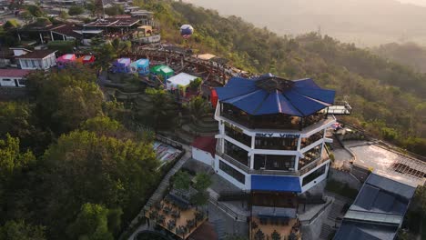 Aerial-view-at-sunset,-HeHa-Sky-View-is-a-tour-that-offers-the-best-views-of-the-city-of-Yogyakarta-and-its-surroundings-from-the-second-floor