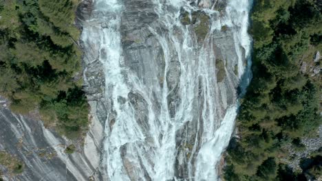 Cascata-del-Toce-falls-plunging-down-vertical-cliff-face,-Val-Formazza,-Italy