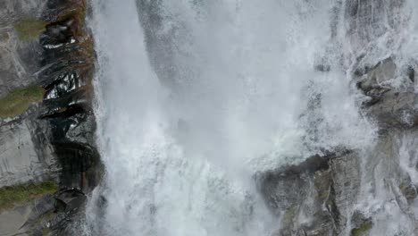 Close-up-aerial-view-of-Cascata-del-Toce-waterfall-plunging-down-cliff,-Italy