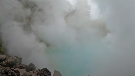 umi-jigoku-or-sea-hell-taken-in-beppu-with-steamy-hot-springs-geyser-steaming-off-the-cobalt-water