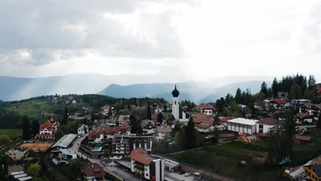 Aerial-view-of-Oberbozen's-quaint-town-in-rural-Italy