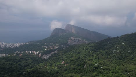 Beautiful-aerial-view-to-rainforest-and-green-city-landscape-in-Rio-de-Janeiro,-Brazil---Chinese-View---Morro-dois-irmãos