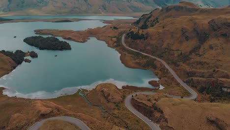Aerial-Drone-Shot-with-Tilt-Up-Reveal-of-the-Countryside-Road-to-Lagunas-de-Atillo-in-Ecuador