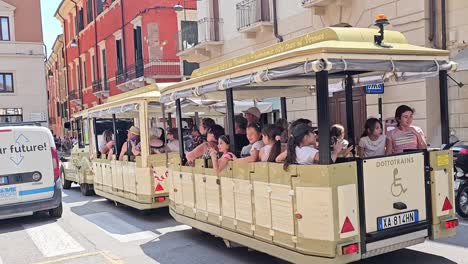 Verona-tourist-train-passing-on-its-city-tour