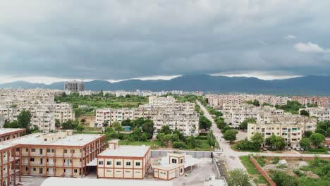 A-view-of-concrete-buildings-in-the-background-of-newly-built-courts-in-G11-Islamabad,-Capital-of-Pakistan