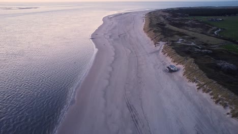 The-beach-near-Hollum-on-the-island-of-Ameland-with-a-nice-pink-glow-of-the-sunset-in-the-footage