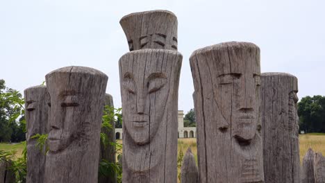 Wooden-monument,-heads-of-shamans.-Spiritual-forces