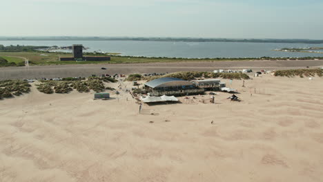 Aerial-View-Of-Natural-High-Kitesurf-School-And-Beachclub-In-Brouwersdam,-Ouddorp,-Netherlands