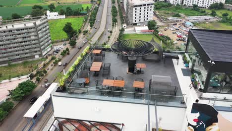 Aerial-view-of-Rajkot-city,-terrace-garden-is-located-on-the-top-floor-of-high-rise-building,-this-terrace-garden-has-a-wonderful-view