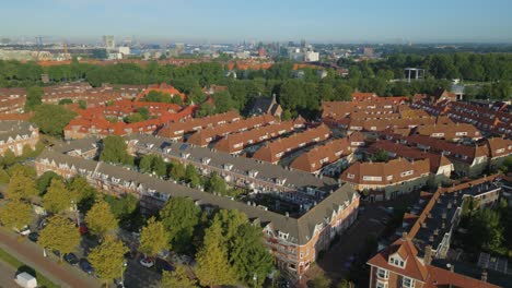 Aerial-above-Meeuwenlaan-in-Vogelbuurt-Amsterdam-Noord-with-center-in-background-pt-1-of-4