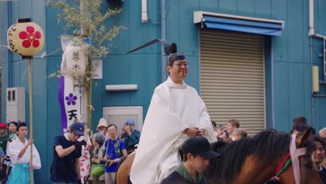 Priest-Riding-Horseback-in-Tenjin-Festival-Slow-Motion-Shot