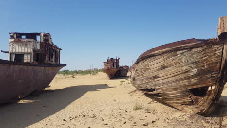 Shipwrecks-in-Sand,-Old-Boats-in-Decay-on-Former-Aral-Sea,-Uzbekistan