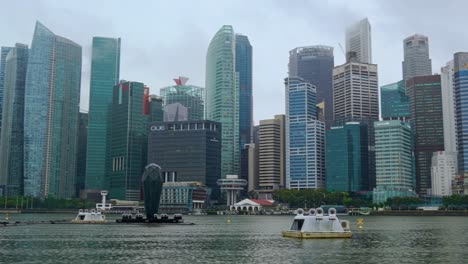 Pan-across-the-city-skyline-at-Marina-Bay,-Singapore