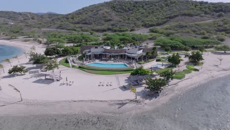 Tropical-beach-paradise-hotel-resort-Puntarena-in-the-Dominican-Republic,-drone