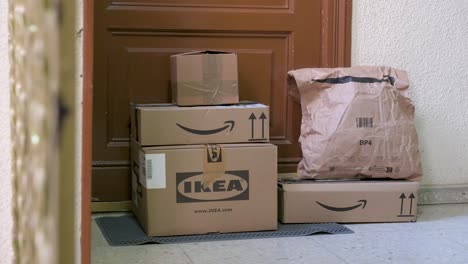 Amazon-and-Ikea-order-delivery-packages-seen-in-front-of-a-customer-door