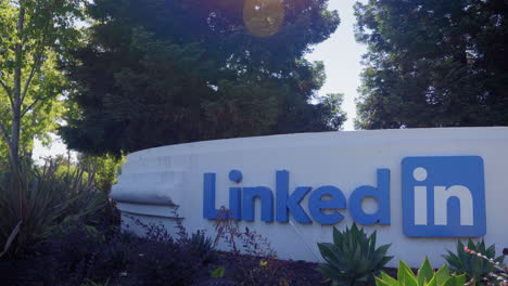 LinkedIn-sign-at-their-headquarters-in-Sunnyvale,-California---tilt-down-reveal