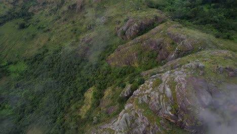 Birds-eye-view-drone-shot-green-mountains-and-rocks-in-nature-of-Africa