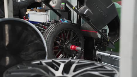 Automatic-wheel-balancer-at-repair-shop