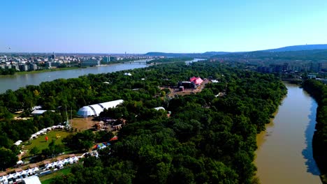 Stage-And-Tents-At-Sziget-Festival-In-Óbuda-Island,-Budapest,-Hungary---aerial-shot
