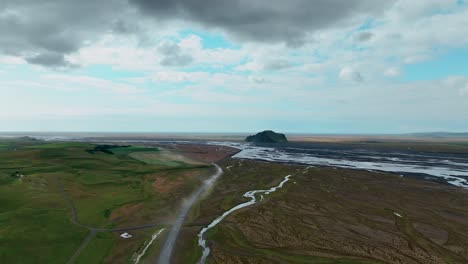 Car-Driving-Through-Icelandic-Highlands-In-South-Iceland---aerial-shot