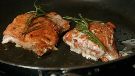 Sockeye-Salmon-Cooking-in-Hot-Pan-with-Rosemary-Seasoning