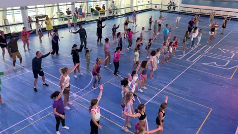 Lisbon,-Portugal---August-2,-2023:-Passengers-participating-in-a-dance-class-aboard-Royal-Caribbean's-Anthem-of-the-Seas