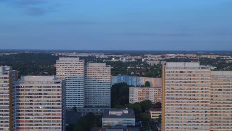Stunning-aerial-top-view-flight-prefabricated-housing-complex,-Panel-system-building-Berlin-Marzahn-Germany-Europe-summer-23